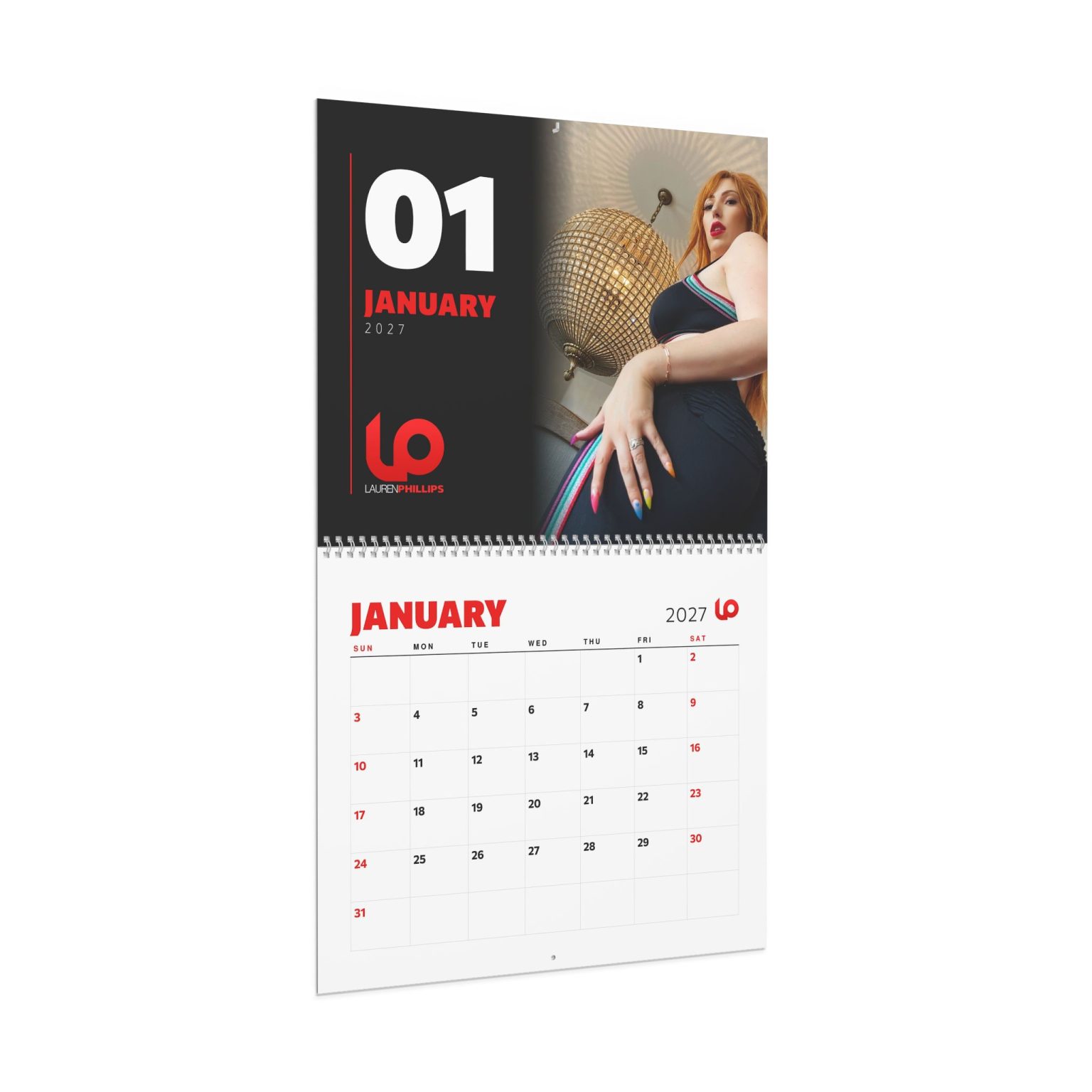 Lauren Phillips 2027 wall calendar hanging on a wall, open to January